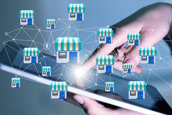 Businessman showing Franchise system on a mobile device.